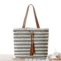 Striped crochet tote bag with brown leather handles and decorative tassel detail - Turquoise Green