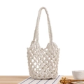 Beige cotton macrame tote bag with hollow crochet design for summer beach styling - White