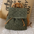 Dark green crochet knit backpack with brown leather straps and drawstring detail - Army Green