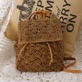 Woven straw backpack in camel brown with faux leather straps for summer beach vacations - Camel