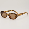 Lunettes de soleil ovales léopard vintage avec verres bruns et détails métalliques - Monture Écaille