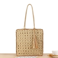 Handmade woven tote bag with fringe details and contrasting colors in a straw finish - Beige