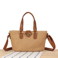 Straw woven tote bag with brown leather straps and gold metal clasp in natural finish - Camel