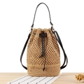 Handmade woven straw bucket bag in natural beige with black leather strap and drawstring - Camel (Black Strap)
