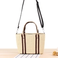 Schicke beige Stroh-Einkaufstasche mit braunen Trägern und metallischen Nieten - Beige
