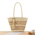 Handgefertigte Stroh-Tragetasche in Beige mit Hohlmustern und Quasten-Holzperlen - Beige