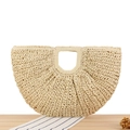 Bohemian style beige handwoven half-moon straw handbag on a rustic wooden table - Beige