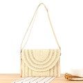 Elegante bolso sobre de paja beige con textura tejida para las vacaciones de verano - Beige