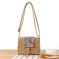 Ethnic paper rope crossbody bag featuring colorful bead embroidery and tassel detail - Camel