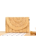 Handmade corn husk envelope clutch in natural beige with a secure elastic fastener - Camel