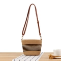 Handcrafted straw crossbody bag with black stripes and brown leather strap on wooden desk - Camel (Black Stripes)