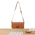 Elegant paper rope woven shoulder bag with brown leather flap and golden rotary lock - Beige