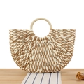 Two-tone woven straw handbag with circular handles in a natural and beige fiber design - Camel
