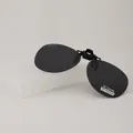 Polarized clip-on sunglasses with black TAC lenses and a portable protective case - Grey Polarized (Round Style)