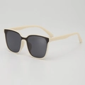 Kids trendy oversized square sunglasses with black and white frames shown at 45-degree angle - Beige Frame