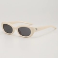Retro cat-eye zonnebril in crème wit montuur met donkergrijze lenzen en UV-bescherming - Retro Ovale Kattenoog Stijl (B01 Y-3) / Beige Frame Grijze Lens