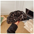 Detail of glossy black shell evening bag with ripple texture and gold chain strap - Off Black