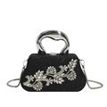 Elegant black glitter evening clutch bag with crystal flower and wavy metal handle - Black
