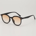 Eleganti occhiali da sole rotondi oversize con montatura scura e lenti sfumate anti-UV - Montatura Nera Lenti Sfumate Rosse