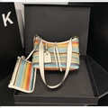 Detailed close-up of a rainbow woven crossbody bag with a matching small zipper pouch - Cream White Rainbow