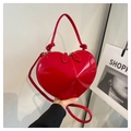 Glossy red heart-shaped handbag with top handle and crossbody strap in patent leather - Shiny Red