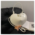 Glossy cream white heart-shaped crossbody bag with top handle and dual zippers - Glossy White