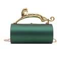 Detail of green cylinder clutch featuring a golden leopard handle and metal chain - Green