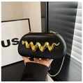 Detail of black semi-circle clutch bag with gold wavy metal decor and snake chain - Black