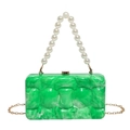 Detail of green marble acrylic clutch with large faux pearl handle and gold chain - Green