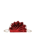 Close-up of shell-shaped red acrylic clutch with glossy metallic finish and gold chain - Red