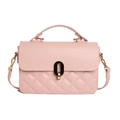 Close-up of pink quilted crossbody bag with gold buckle and chain strap detail - Pink