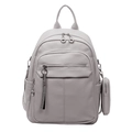 Close-up of light grey faux leather backpack with litchi texture and silver zipper details - Gray