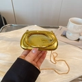 Elegante borsa da sera in acrilico dorato con manico in metallo e tracolla a catena - Oro