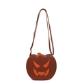 Brown pumpkin shoulder bag with orange evil face design and adjustable strap - Brown