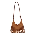Close-up of brown suede shoulder bag featuring long fringe tassels and bohemian knot detail - Brown