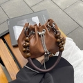 Brown PU leather bucket bag with retro woven handle and wooden bead accents - Brown