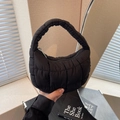 Mini black quilted crescent bag with puffer texture and top handle for women - Black