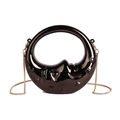 Detail of crescent moon mini bag in glossy black with star and moon face embossing - Black