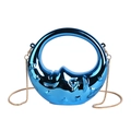 Close-up of crescent moon handbag in metallic blue with embossed face and gold chain - Blue