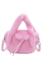 Close-up of pink faux fur plush handbag showing leather drawstring knot and silver hardware - Pink