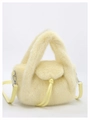 Detail of pale yellow faux fur handbag with soft texture and silver lobster clasp strap - Yellow