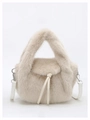 Detail of beige faux fur handbag showing plush texture and white leather shoulder strap - Apricot