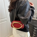 Chic red pebble-shaped PU crossbody bag with large gold C-hardware and chain strap - Red