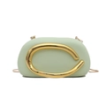 Mint green acrylic round evening bag with gold C-shaped metal handle and chain strap - Green