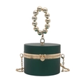 Detail of dark green cylindrical acrylic clutch with gold beaded handle and metal chain - Green