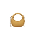 Detail of yellow acrylic evening bag showing matte texture and knotted handle design - Yellow