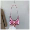 Minibolso de charol rosa brillante con lazo grande y correa fina para hombro de niña - Rosa