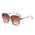 Lunettes de soleil oversize écailles avec verres dégradés marron et détails floraux dorés - C3 Monture Écaille Lentille Thé Dégradé