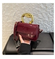 Deep red patent leather crossbody bag with artistic gold metal handle and shoulder strap - Red