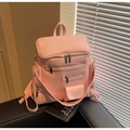 Pink quilted backpack with large capacity and multi-pocket design on leather background - Pink